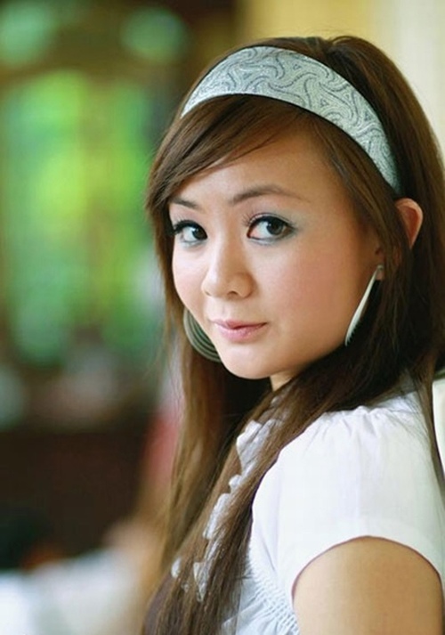 Bất ngờ với vẻ ngoài thay đổi của &#34;bé&#34; Xuân Mai khi làm mẹ - 7