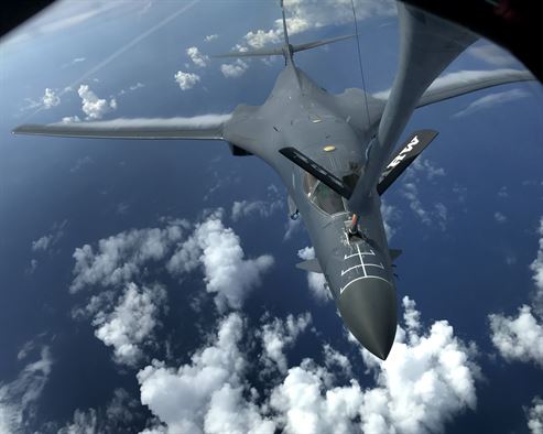 Bị Trump đe dọa, Triều Tiên cân nhắc dùng tên lửa Hwasong-12 nghiền nát Guam - 3
