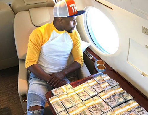 Mayweather giàu "nứt đố đổ vách" mà còn xù nợ - 1
