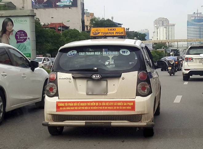 Bộ GTVT: Các địa phương sẽ quyết định việc dừng hay tiếp tục thí điểm xe hợp đồng kiểu Grab, Uber - 2