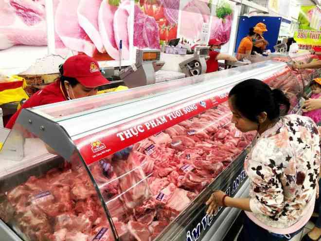 TP.HCM: Giá heo hơi giảm nhưng giá thịt bán lẻ tại các chợ dân sinh không giảm - 1