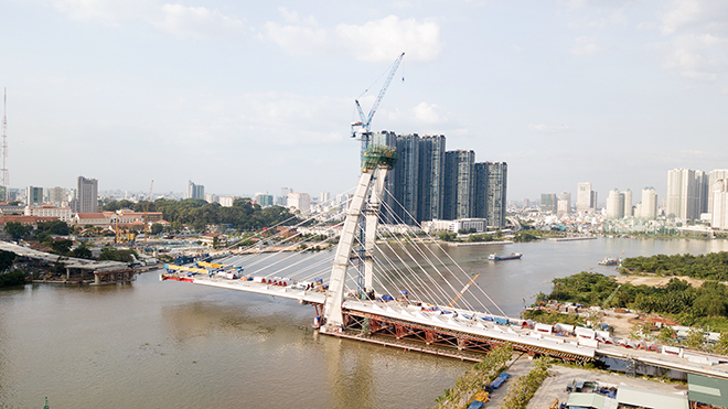Ảnh: Cầu biểu tượng mới ở TP.HCM bắc qua sông Sài Gòn “đứng hình” sau 5 năm khởi công - 4