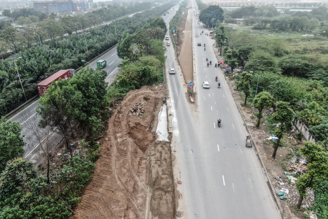 Xem công trường mở rộng đường gom, khắc phục tình trạng &#34;cứ mưa là ngập&#34; ở Đại lộ Thăng Long - 8