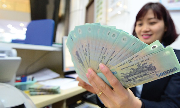 Thu nhập bao nhiêu mỗi tháng để có thể sống được ở Hà Nội và TP.HCM? - 1