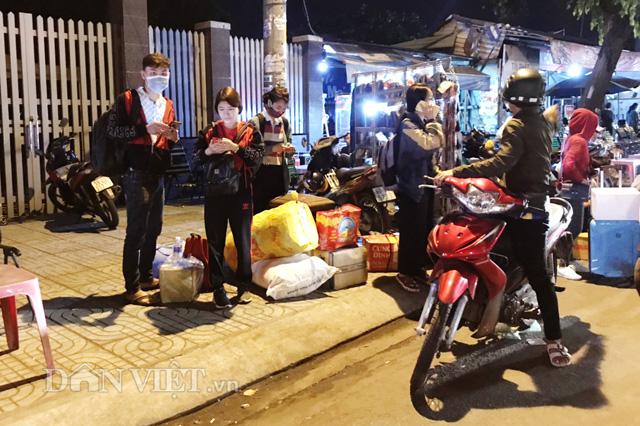 Ảnh: Từ mờ sáng, dòng người lũ lượt đổ về TP.HCM - 5