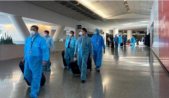 Đằng sau chuyến bay đầu tiên từ Mỹ đưa 343 người Việt về nước - 21