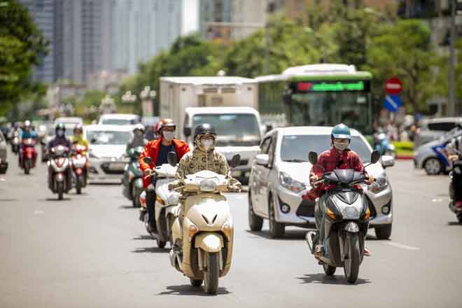 Miền Bắc bước vào đợt nắng nóng gay gắt, có nơi trên 39 độ C - 1
