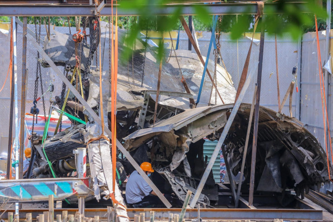 Xác máy bay B52 hồ Hữu Tiệp đã được trục vớt - 9