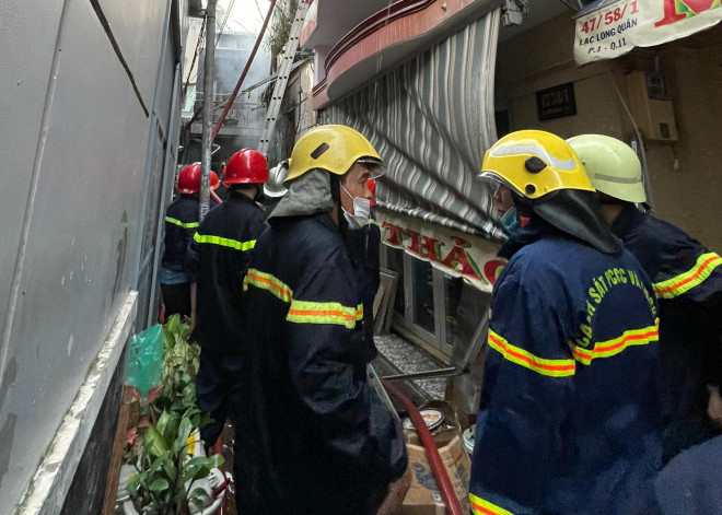 Hai ngày sau vụ cháy 8 người chết ở TPHCM: Tang thương bao phủ khu dân cư - 3