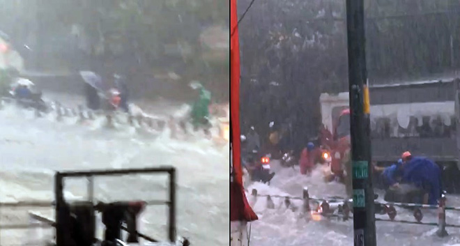 Clip: Nước chảy như lũ quét, cuốn phăng cả người lẫn xe máy ở Thủ Đức - 2