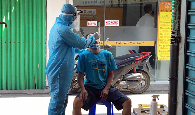 TP.HCM: Phong tỏa một phần chợ Phú Nhuận để lấy mẫu xét nghiệm COVID-19 - 4