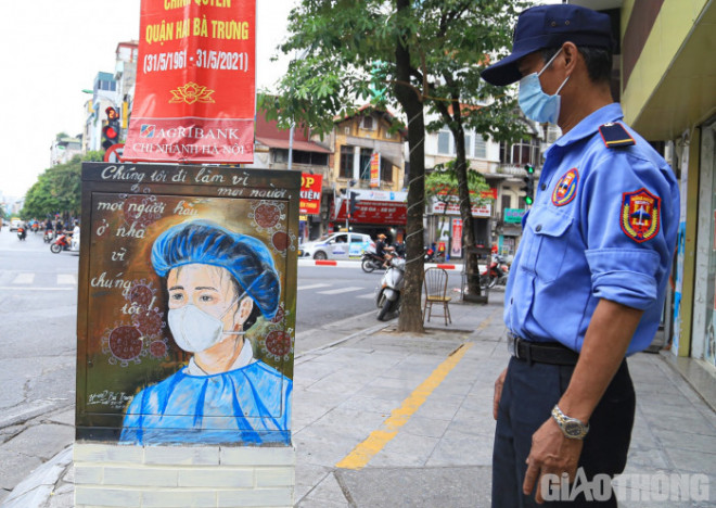 Bốt điện ở Hà Nội "thay áo mới" bằng tranh chống dịch COVID-19 - 6