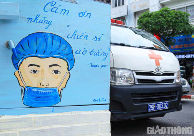 Bốt điện ở Hà Nội "thay áo mới" bằng tranh chống dịch COVID-19 - 7