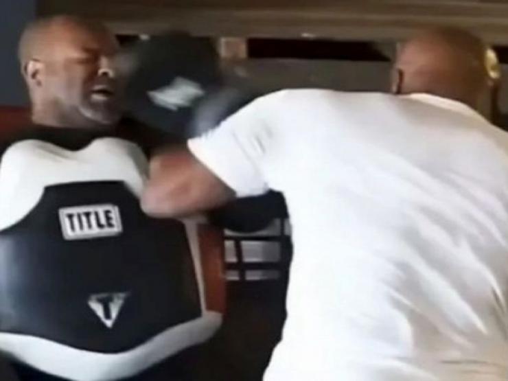 Mike Tyson punched the coach straight in the face, 