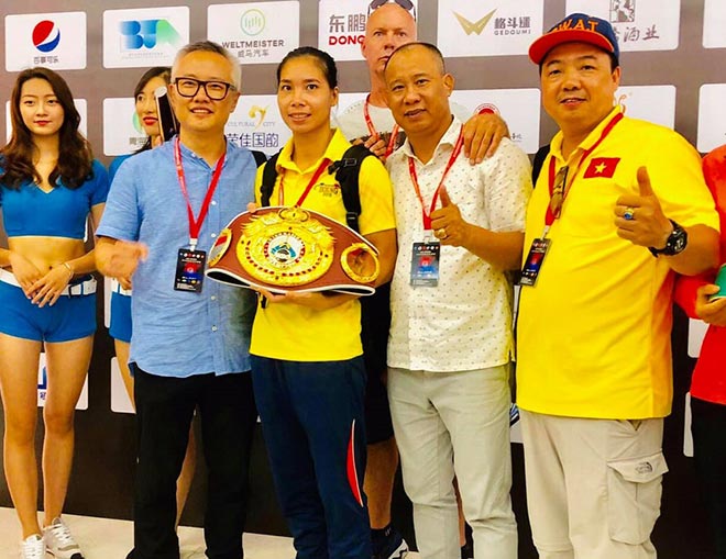 Bà mẹ một con Việt Nam đánh bại nhà vô địch boxing Trung Quốc - 1