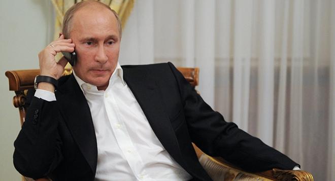 Hé lộ tính năng &#34;siêu độc&#34; trong điện thoại di động của Tổng thống Putin - 1