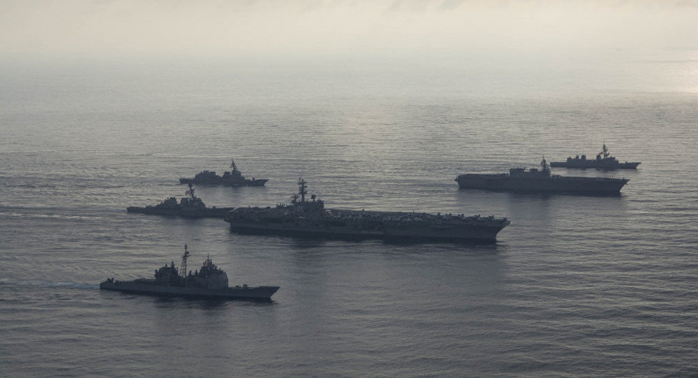 Tàu sân bay Mỹ bị 7 tàu chiến Trung Quốc bao vây ở Biển Đông? - 1