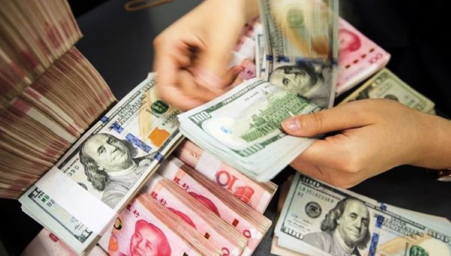 Tiền Việt đang mạnh hơn so với tiền Trung Quốc - 1