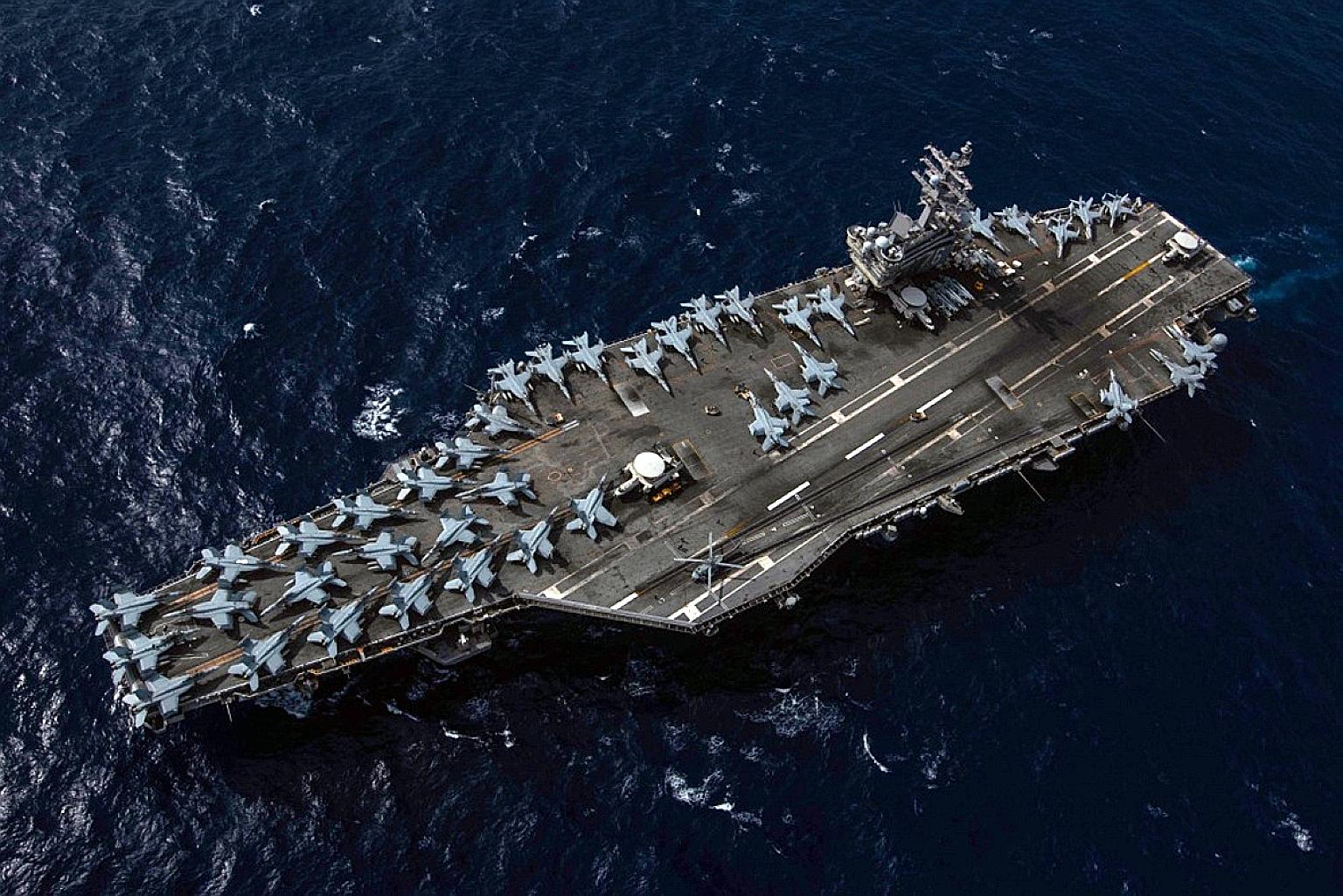 Mỹ tuyên bố tiếp tục tập trận tàu sân bay ở Biển Đông, thách thức TQ - 1