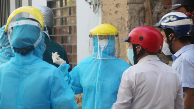 Khử khuẩn nhà riêng, khu phố nơi bệnh nhân mới nhất mắc COVID-19 sinh sống - 11