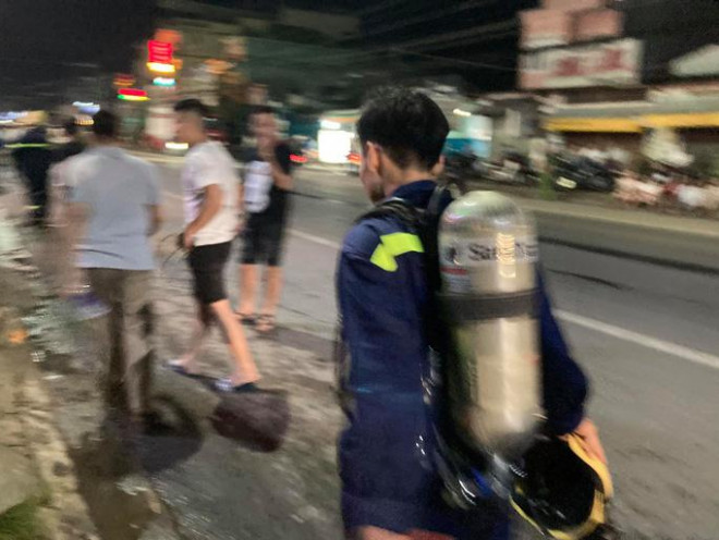 Cả trăm người trắng đêm chui xuống cống tìm người phụ nữ bị nước cuốn ở Đồng Nai - 8