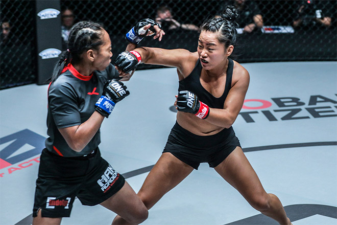 Beating Vietnamese-born MMA female Bi Nguyen on the stage to fight the East Asian champion - 3