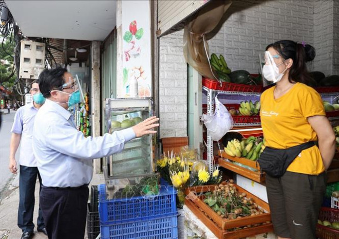 Thủ tướng Phạm Minh Chính kiểm tra đột xuất các điểm nóng về dịch Covid-19 ở Hà Nội - 8