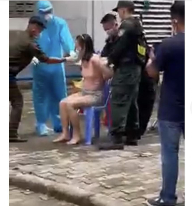 Bình Dương: Không hợp tác, người phụ nữ bị cưỡng chế test nhanh Covid-19 - 2