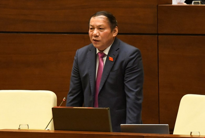 Bộ trưởng Công an Tô Lâm trả lời chất vấn về hộ chiếu mẫu mới - 2