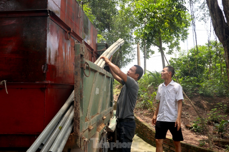 Hà Nội: Chật vật &#39;mang&#39; nước giếng về làng dù sống giữa hai nhà máy nước lớn - 4