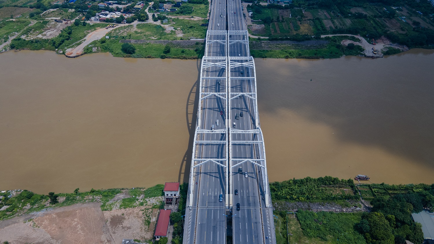 Chiêm ngưỡng cây cầu vòm thép vượt sông rộng nhất Việt Nam - 16