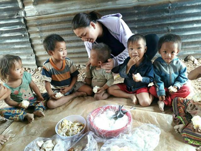 Young teachers cook for hundreds of poor children.