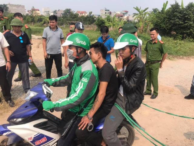 Cận cảnh 2 nghi phạm thực nghiệm hiện trường vụ sát hại nam sinh chạy Grab