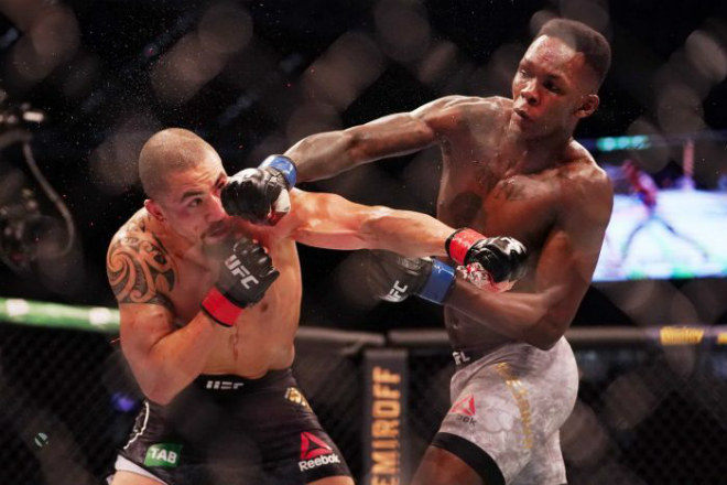 UFC uy chấn võ lâm: Nhận 1 đòn trả 2 đấm knock-out để lên ngôi mãn nhãn - 1