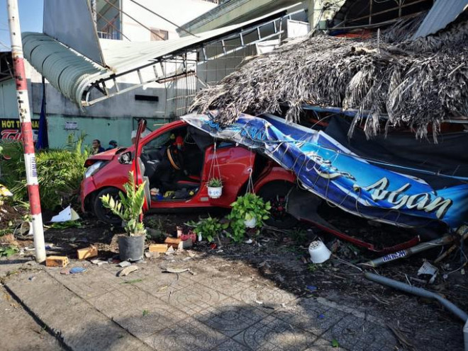 A car crashes a series of motorcycles, a cafe collapses along the road - 6