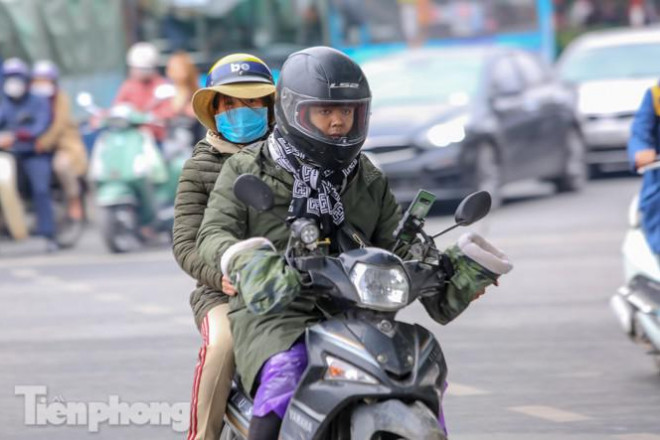 Trời rét đậm đột ngột, người Hà Nội co ro trong nhiều lớp áo - 10