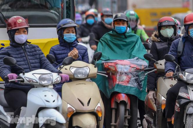 Trời rét đậm đột ngột, người Hà Nội co ro trong nhiều lớp áo - 15