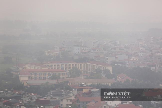 Hà Nội bị "bủa vây" bởi sương mù dày đặc từ sáng đến đêm - 11