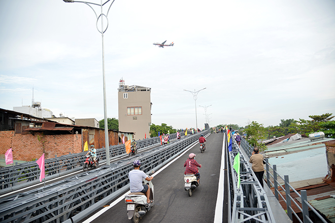 Cầu sắt bạc tỷ nối 2 quận ở TP.HCM, xóa cảnh “qua sông phải lụy đò” - 2