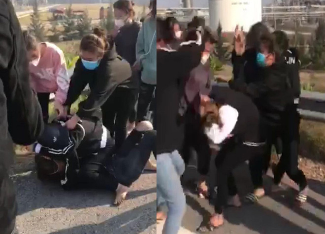 Hai cô gái bị đánh hội đồng dã man, nhóm thanh niên đứng ngoài reo hò - 1