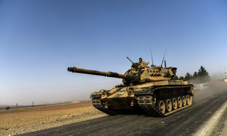 Ông Erdogan tuyên bố về việc đưa xe tăng, binh sĩ vượt biên giới Syria - 1