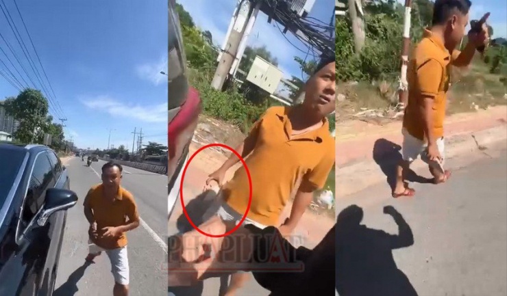 Clip: Cán bộ cảnh sát giao thông mặc đồ thường chửi thề, cầm gạch đá định đánh người - 1