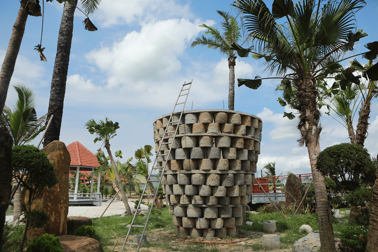 Ảnh: Chiêm ngưỡng tháp hình hạt lúa ghép bằng cối đá vừa đạt kỷ lục châu Á - 3