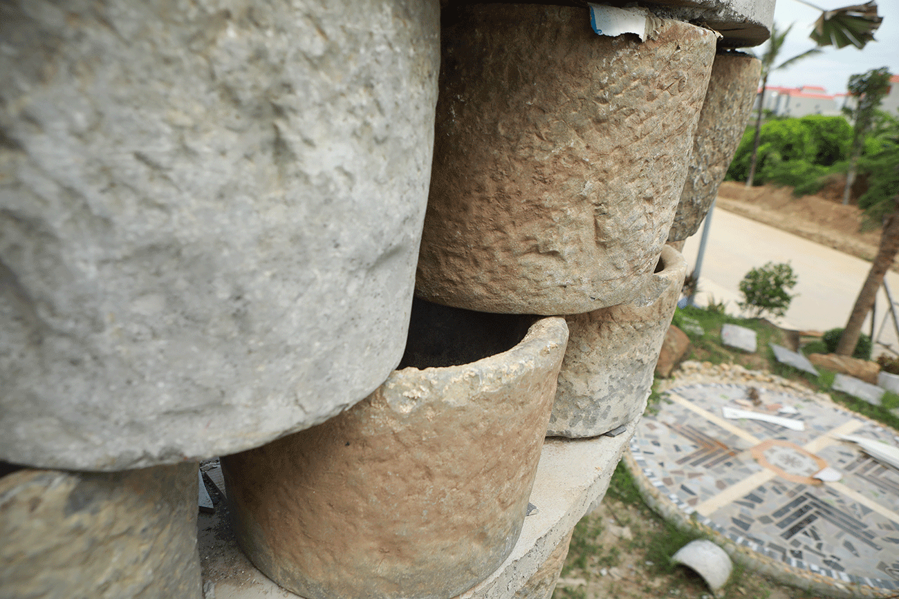 Ảnh: Chiêm ngưỡng tháp hình hạt lúa ghép bằng cối đá vừa đạt kỷ lục châu Á - 8